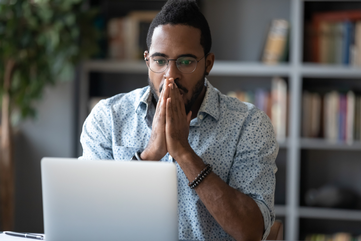 very surprised man looking on laptop | AfterPullback